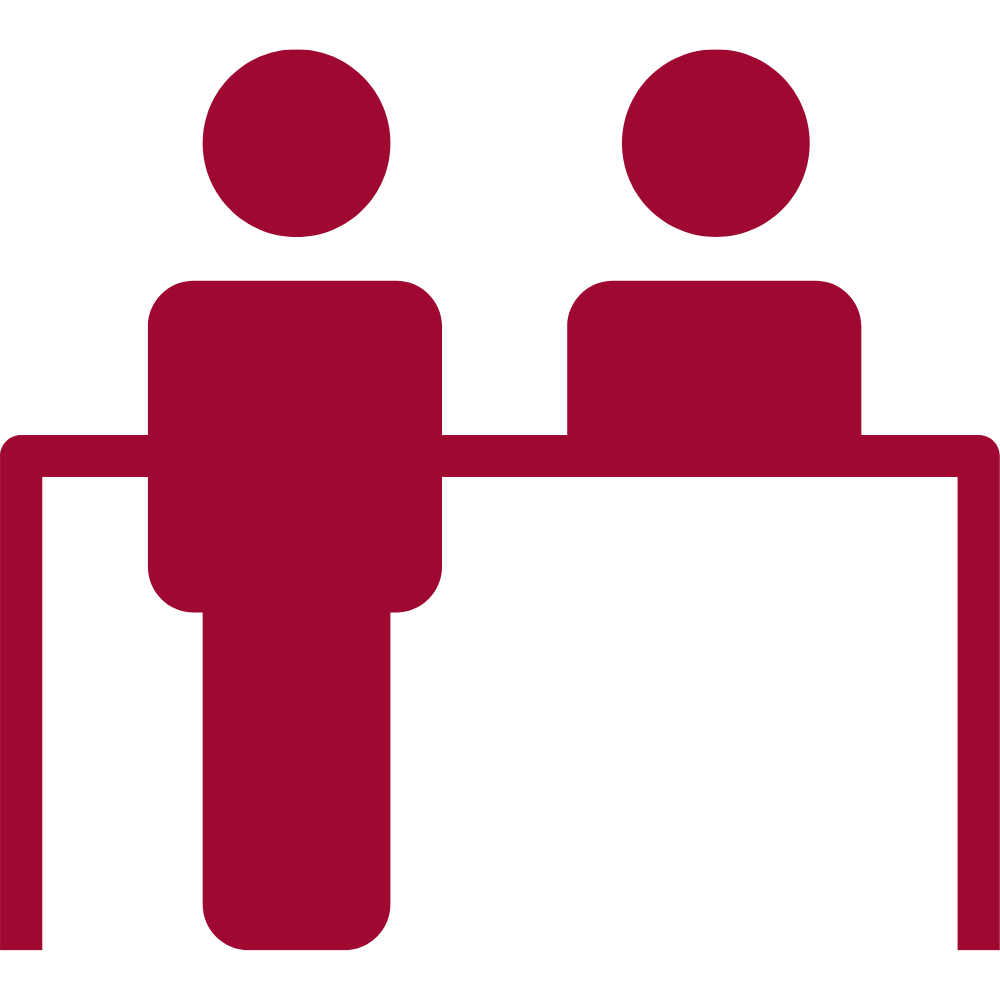 icon: one person in front of a counter and one behind