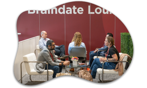 Small groups meeting in the Braindate Lounge