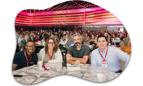 Group of attendees around a table