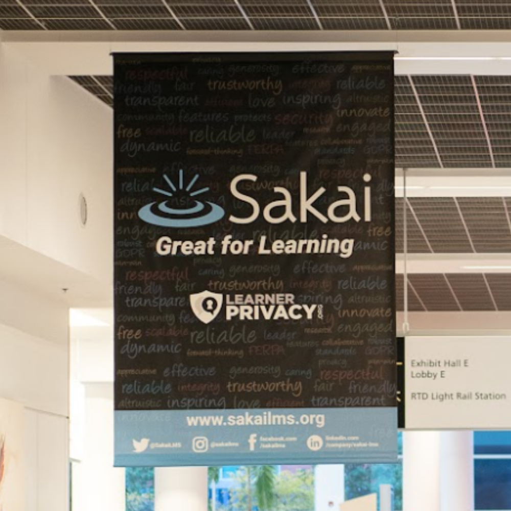 Sponsor Banner with logo hanging from ceiling
