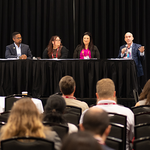 panel in front of an audience